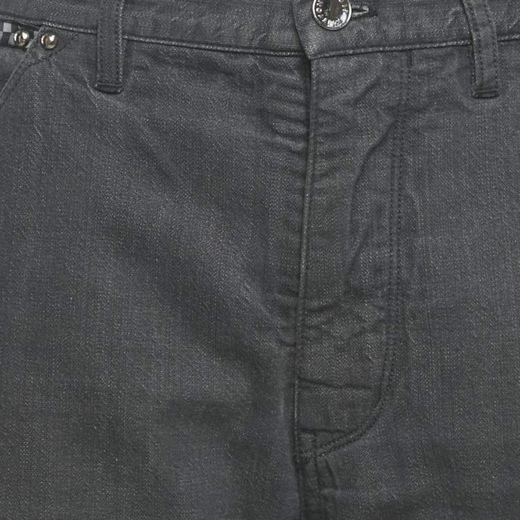 مملوكة مسبقًا بنطلون جينز لوي فيتون دنيم أزرق بتفاصيل الشعار أرجل واسعة مقاس وسط 29 بوصة