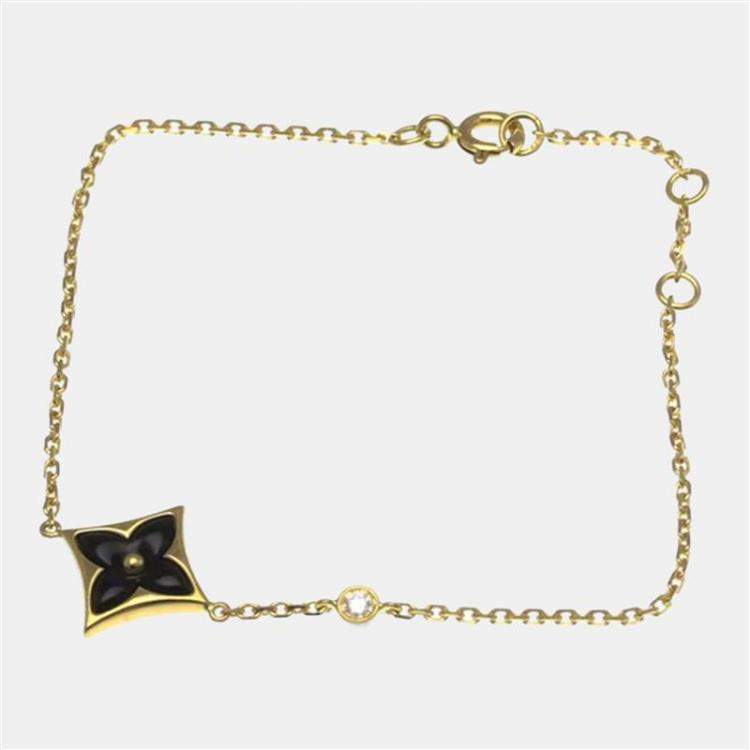 Pre Owned Louis Vuitton Star Blossom Yellow Gold 18K Diamond Onyx Charm Bracelet Onyx