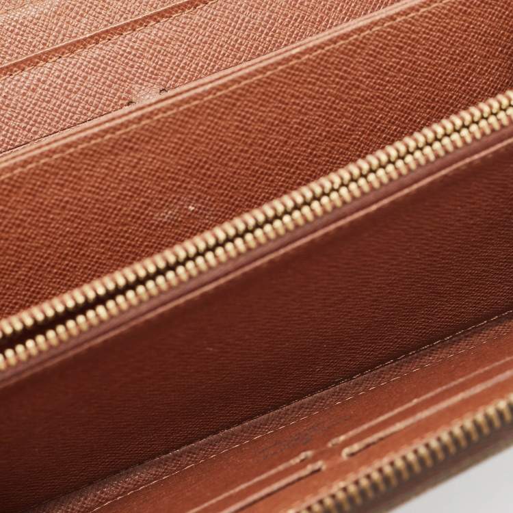 Pre Owned Louis Vuitton Monogram Canvas Zippy Wallet 