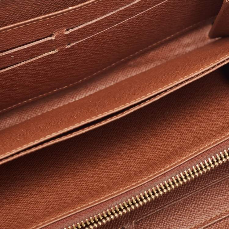 Pre Owned Louis Vuitton Monogram Canvas Zippy Wallet 