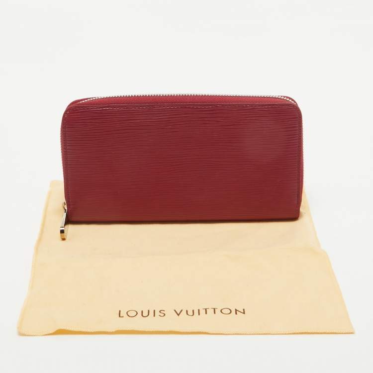 Pre Owned Louis Vuitton Fuchsia Epi Leather Zippy Wallet
