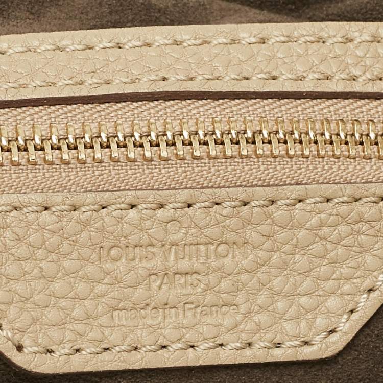 Pre Owned Louis Vuitton Beige Monogram Mahina Leather Surya L Bag