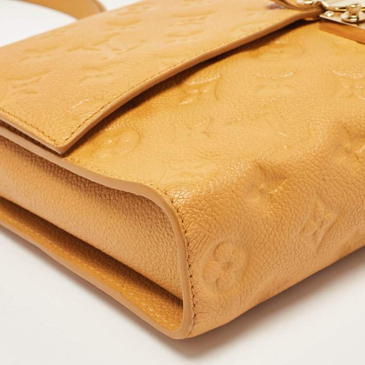 Pre Owned Louis Vuitton Mustard Monogram Empreinte Leather Fascinante Bag