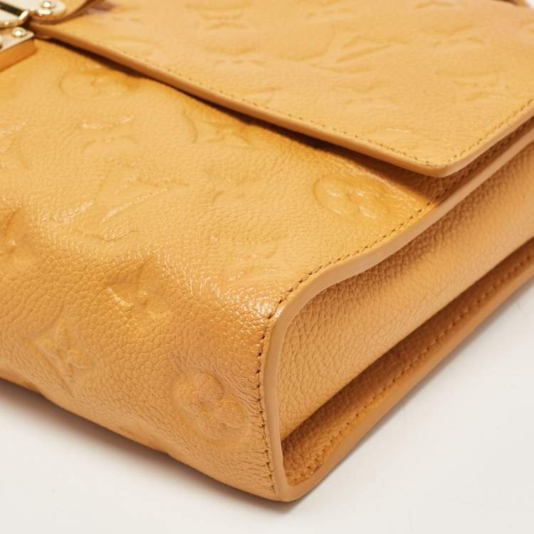 Pre Owned Louis Vuitton Mustard Monogram Empreinte Leather Fascinante Bag