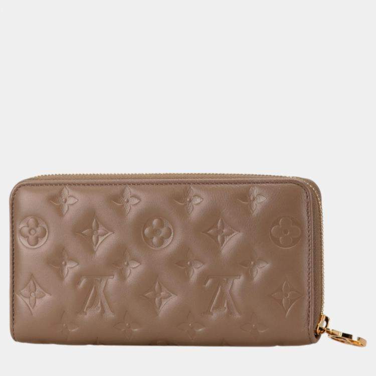 Pre Owned Louis Vuitton Beige Leather Monogram Zippy Wallet