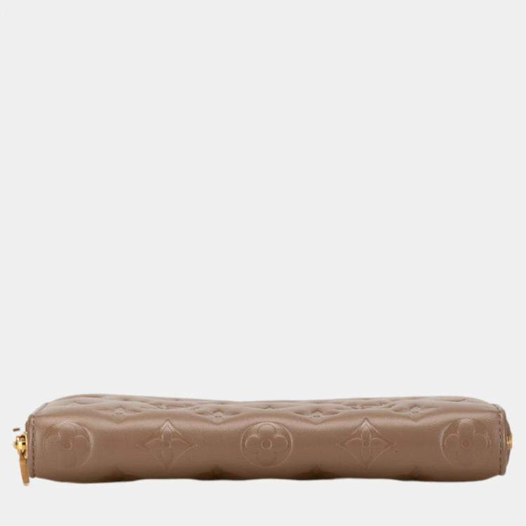 Pre Owned Louis Vuitton Beige Leather Monogram Zippy Wallet