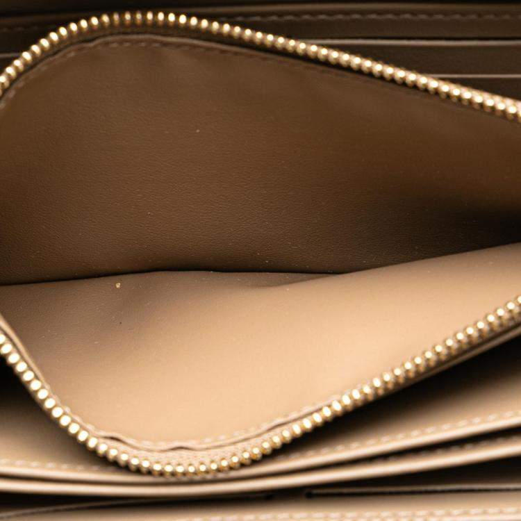Pre Owned Louis Vuitton Beige Leather Monogram Zippy Wallet