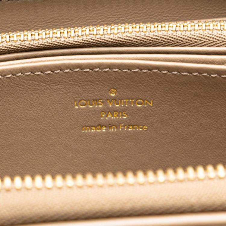Pre Owned Louis Vuitton Beige Leather Monogram Zippy Wallet