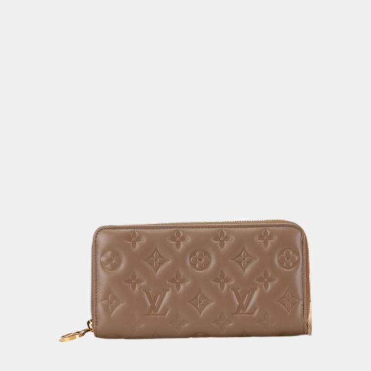 Pre Owned Louis Vuitton Beige Leather Monogram Zippy Wallet