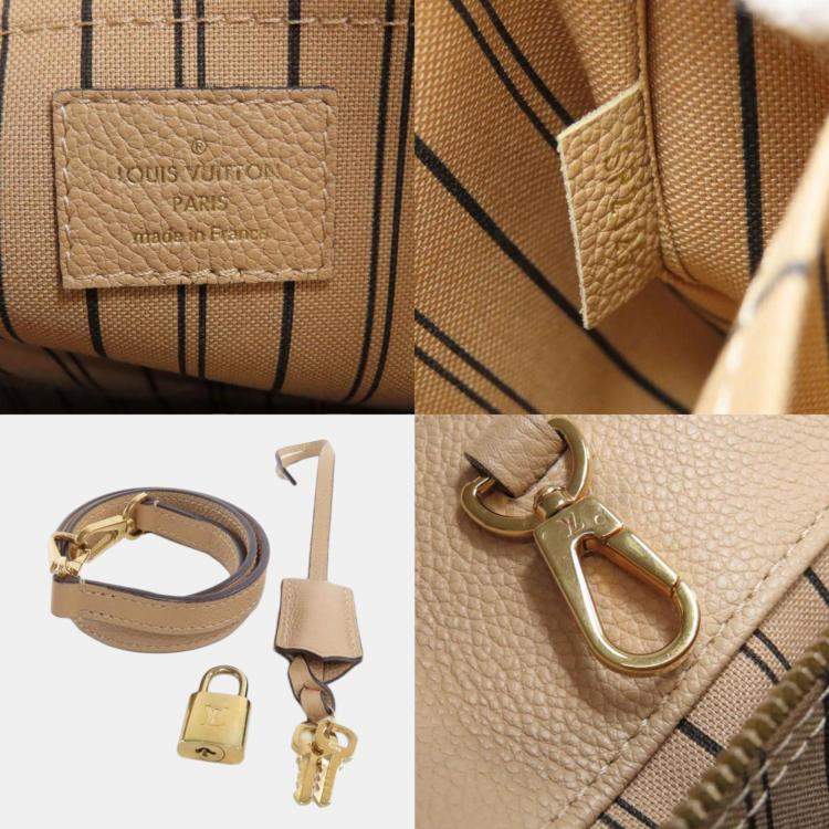 Pre Owned Louis Vuitton Empreinte Montaigne MM Handbag