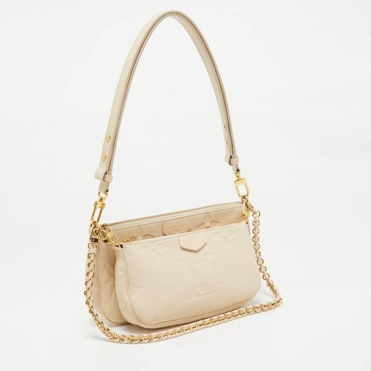 Pre Owned Louis Vuitton Cream Empreinte Leather Multi Pochette Accessoires Bag