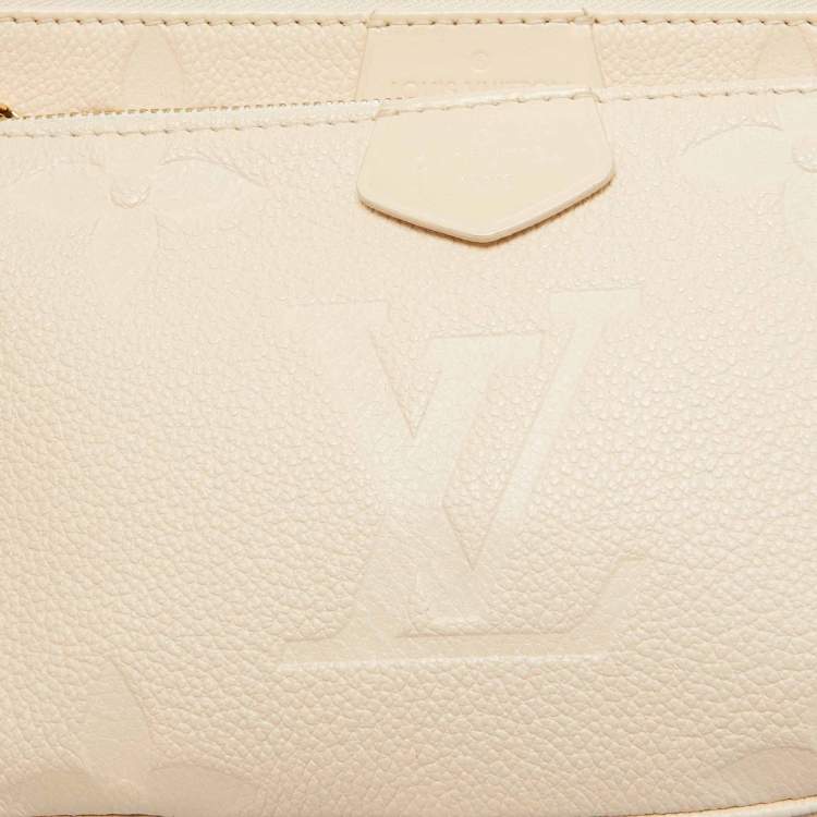 Pre Owned Louis Vuitton Cream Empreinte Leather Multi Pochette Accessoires Bag