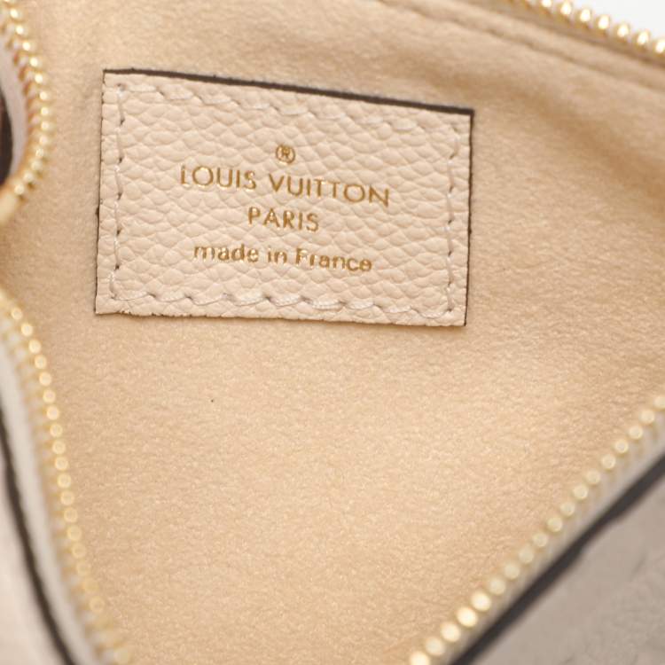 Pre Owned Louis Vuitton Creme Empreinte Leather Loop Hobo