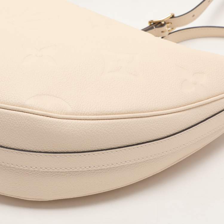 Pre Owned Louis Vuitton Creme Empreinte Leather Loop Hobo