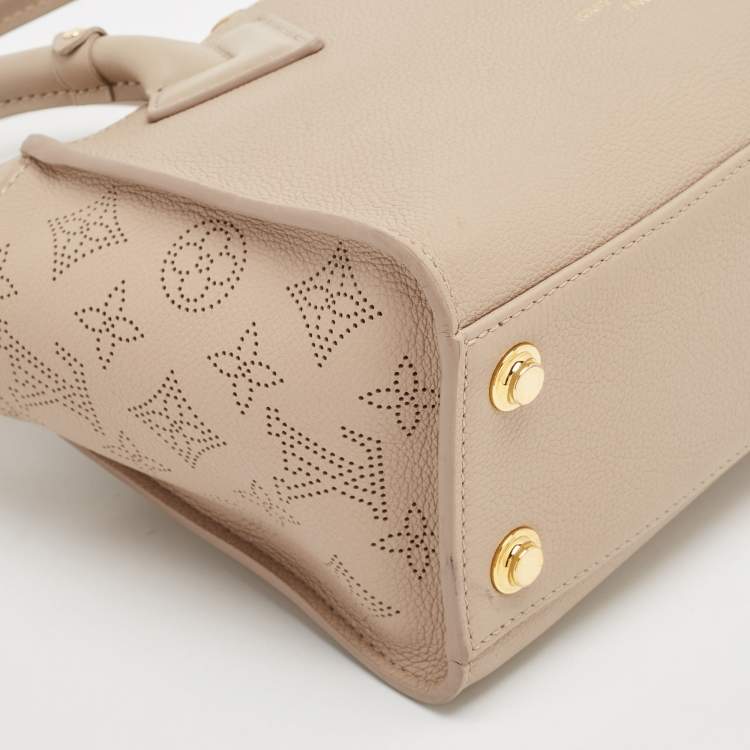 مملوكة مسبقًا Louis Vuitton Galet Monogram Mahina Leather On My Side PM Bag