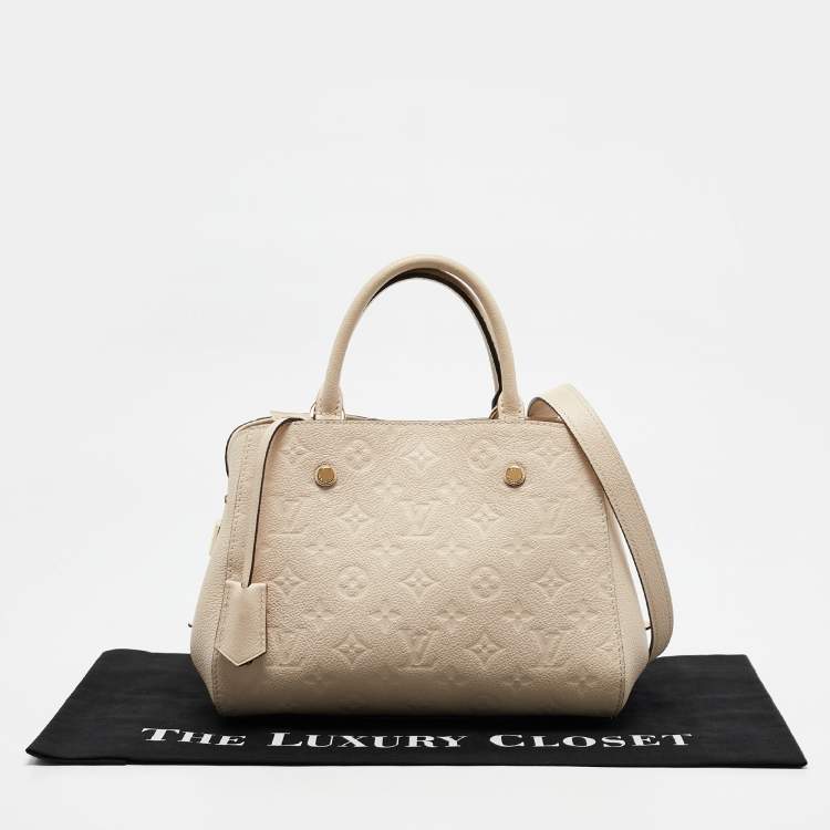Pre Owned Louis Vuitton Creme Empreinte Leather Montaigne BB Bag