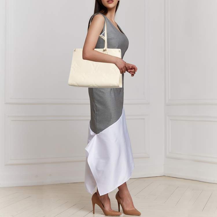 Pre Owned Louis Vuitton Cream Monogram Empriente Leather Giant Onthego MM Bag