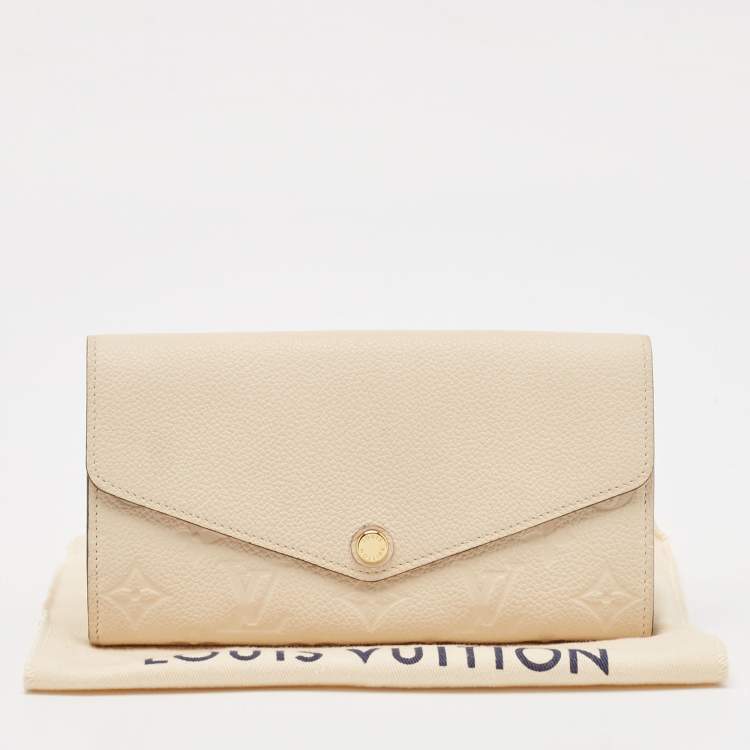 Pre Owned Louis Vuitton Tourterelle Monogram Empreinte Leather Sarah Wallet