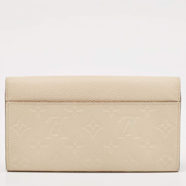 Pre Owned Louis Vuitton Tourterelle Monogram Empreinte Leather Sarah Wallet