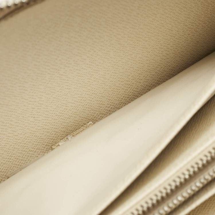 Pre Owned Louis Vuitton Ivory Epi Leather Zippy Wallet