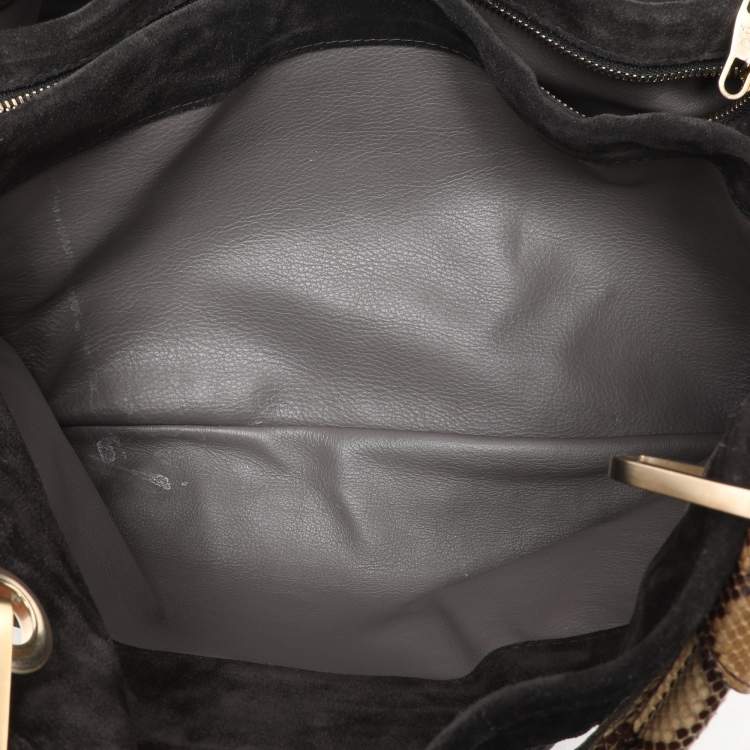 مملوكة مسبقًا Louis Vuitton Black Monogram Embossed Suede Limited Edition Whisper PM Bag