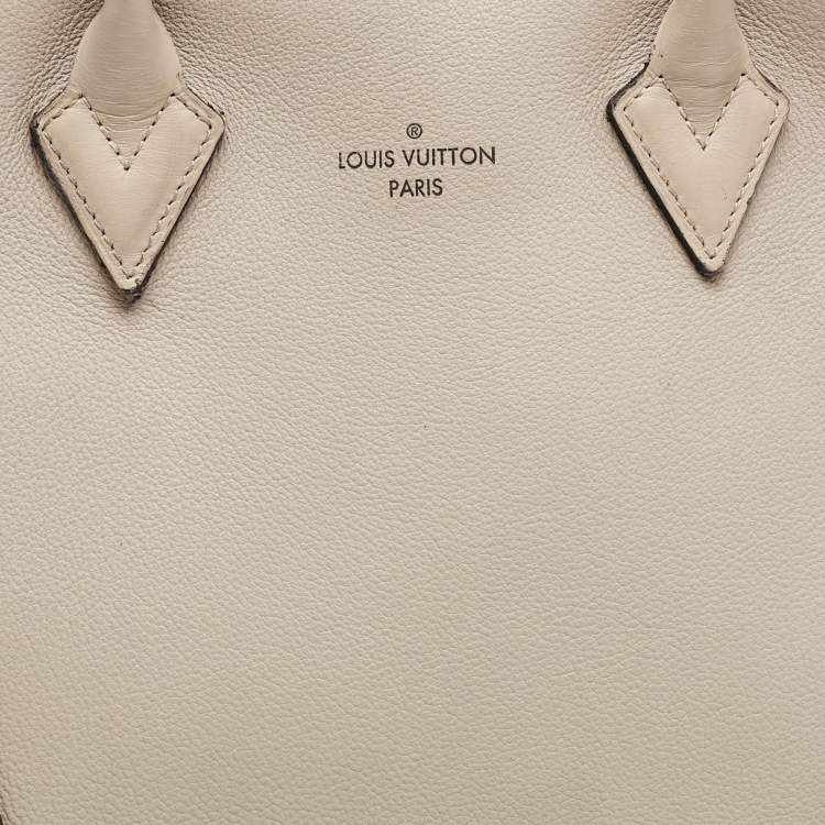 Pre Owned Louis Vuitton Galet Beige Monogram Leather W PM Bag