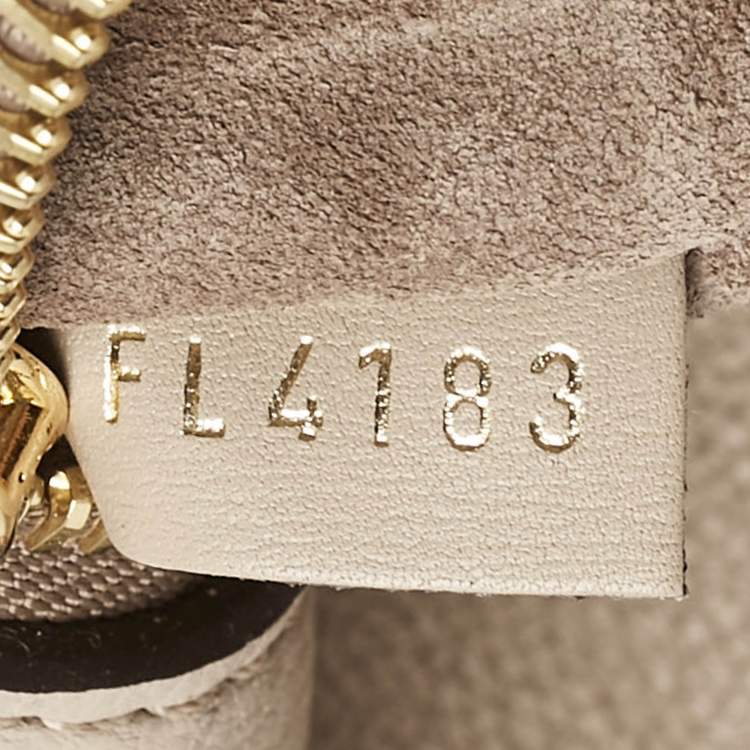 Pre Owned Louis Vuitton Galet Beige Monogram Leather W PM Bag