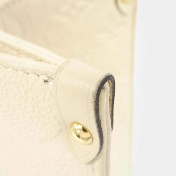 Pre Owned Louis Vuitton Cream Monogram Empreinte Leather OnTheGo MM Handbag