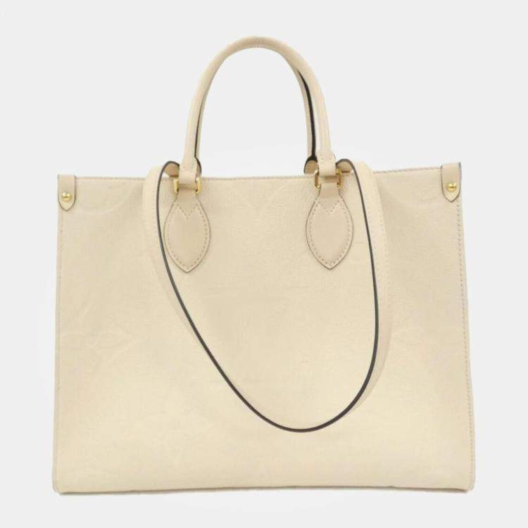 Pre Owned Louis Vuitton Cream Monogram Empreinte Leather OnTheGo MM Handbag