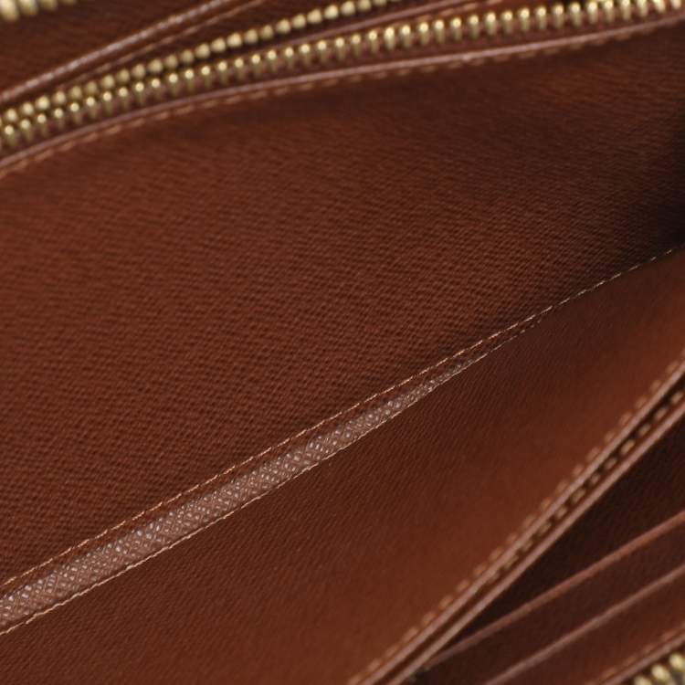 Pre Owned Louis Vuitton Monogram Canvas Zippy Wallet 