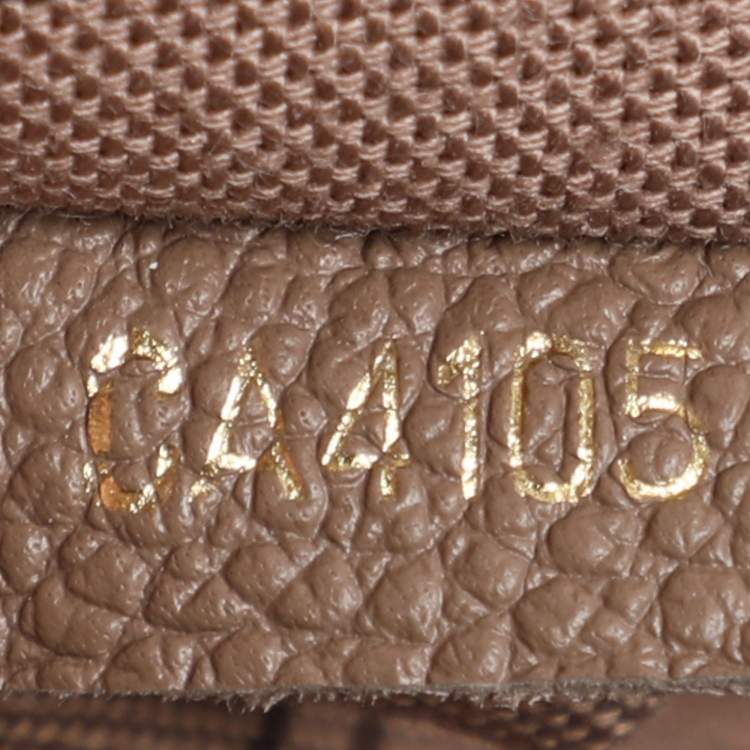 Pre Owned Louis Vuitton Beige Monogram Empreinte Leather Artsy MM Bag