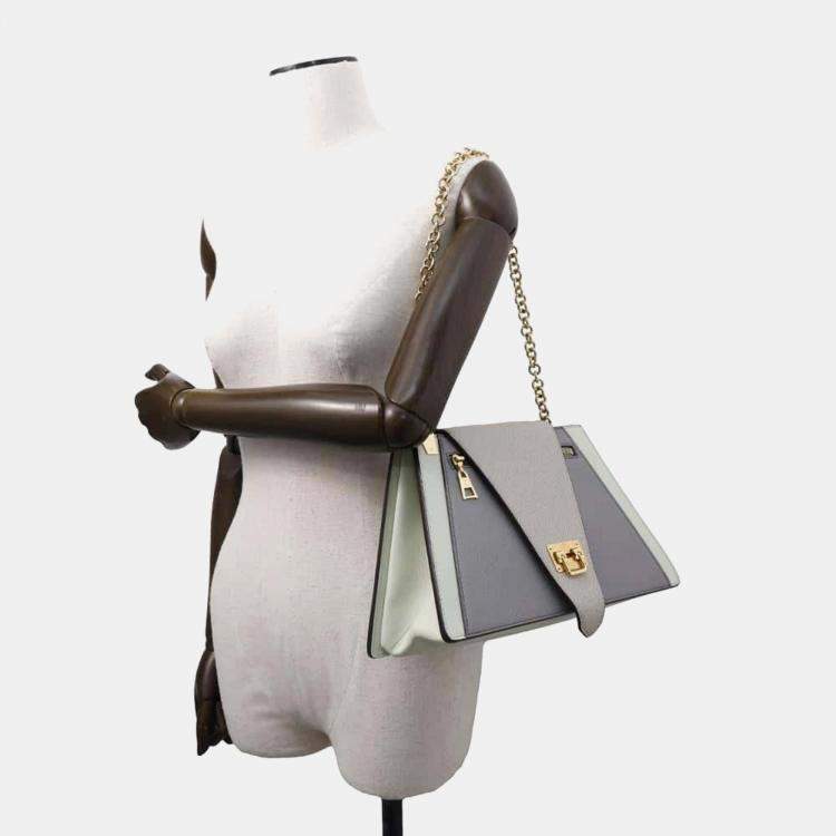 Pre Owned Louis Vuitton Gray Taiga Leather Trapeze Shoulder Bag