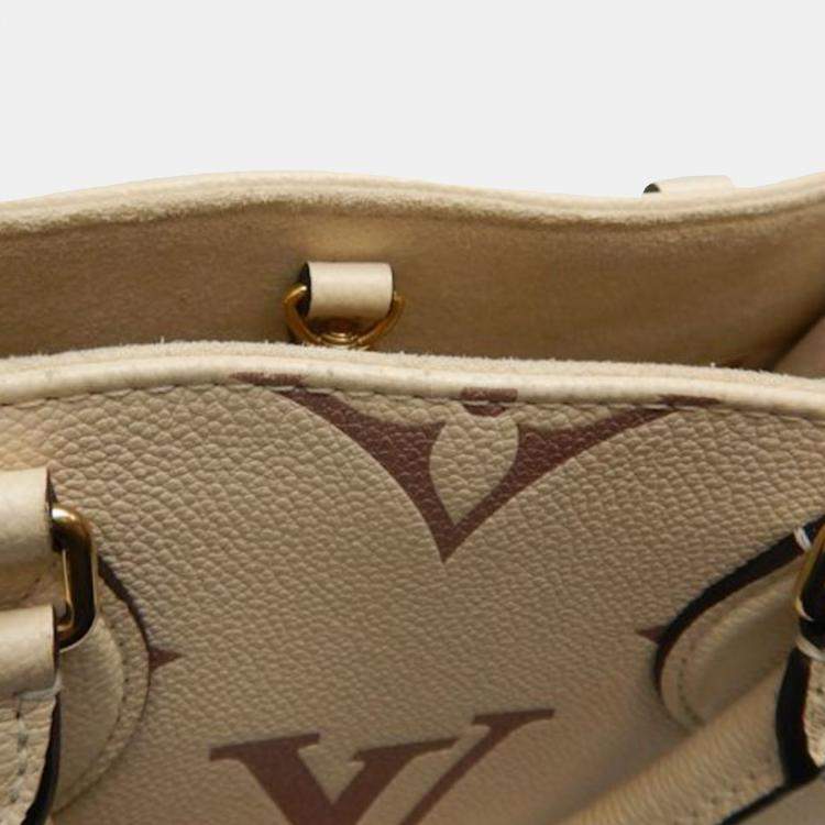 Pre Owned Louis Vuitton Cream Bicolor Monogram Empreinte Leather OnTheGo PM Tote Bag