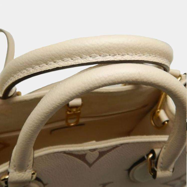 Pre Owned Louis Vuitton Cream Bicolor Monogram Empreinte Leather OnTheGo PM Tote Bag