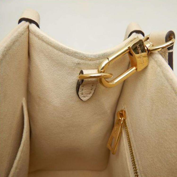 Pre Owned Louis Vuitton Cream Bicolor Monogram Empreinte Leather OnTheGo PM Tote Bag