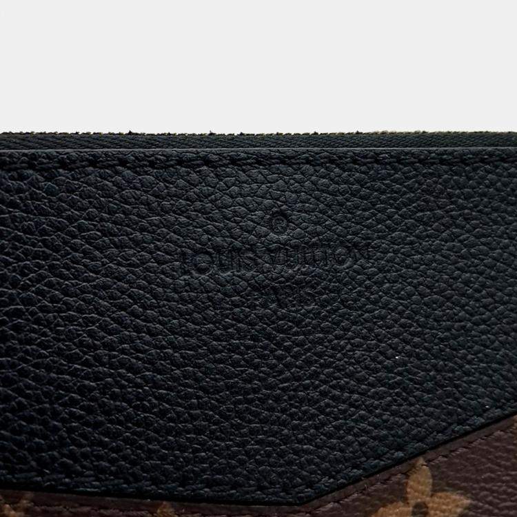 Pre Owned Louis Vuitton Brown PVC Daily Clutch