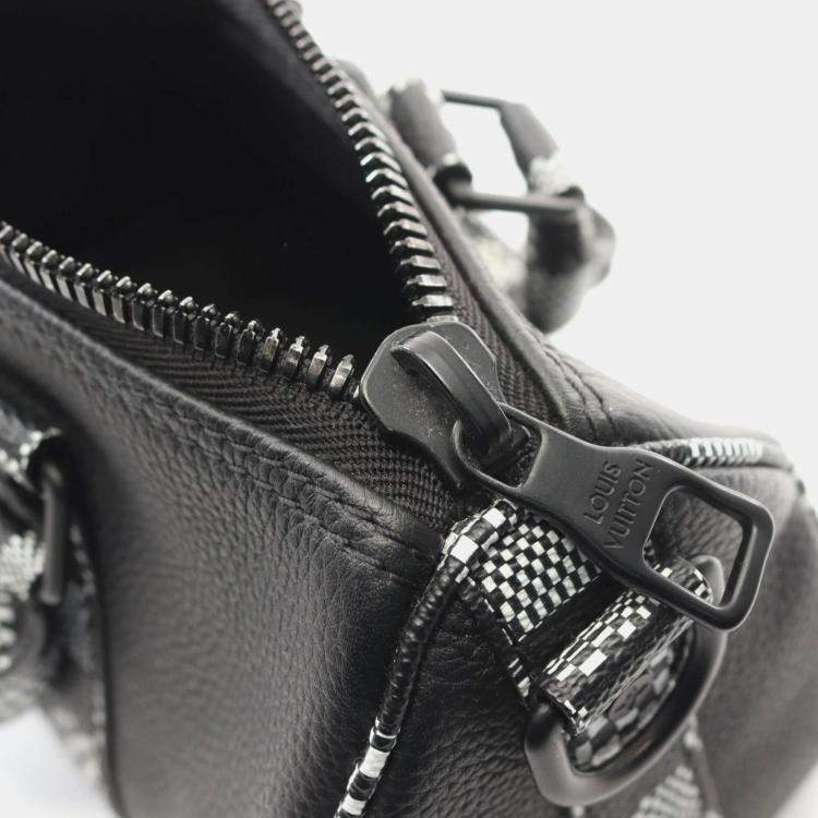 مملوكة مسبقًا Louis Vuitton Black Leather with Limited Edition Distorted Damier XS Keepall Bandouliere Bag 