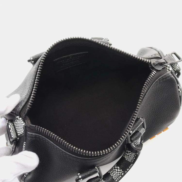 مملوكة مسبقًا Louis Vuitton Black Leather with Limited Edition Distorted Damier XS Keepall Bandouliere Bag 