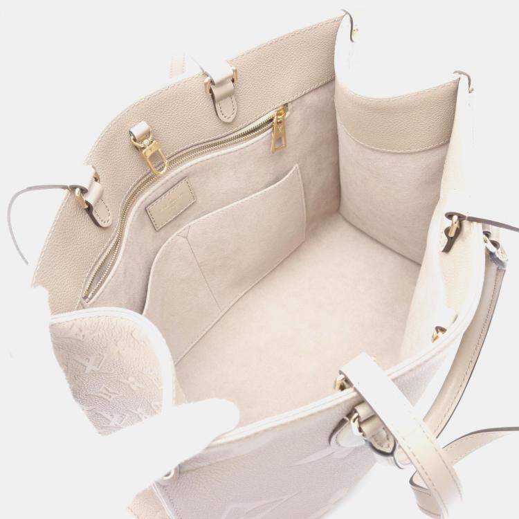 Pre Owned Louis Vuitton OnTheGo MM Beige Monogram Empreinte Leather Tote Bag