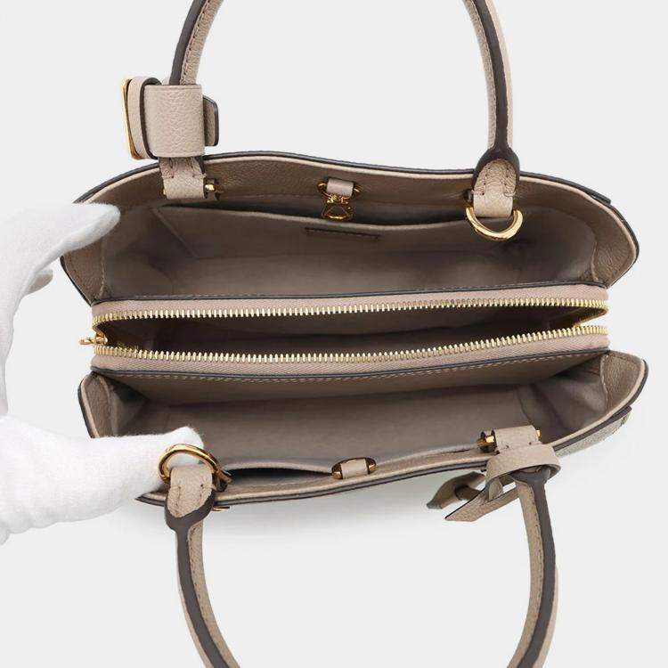 Pre Owned Louis Vuitton Montaigne BB Tourterelle Clair Monogram Empreinte Leather Handbag