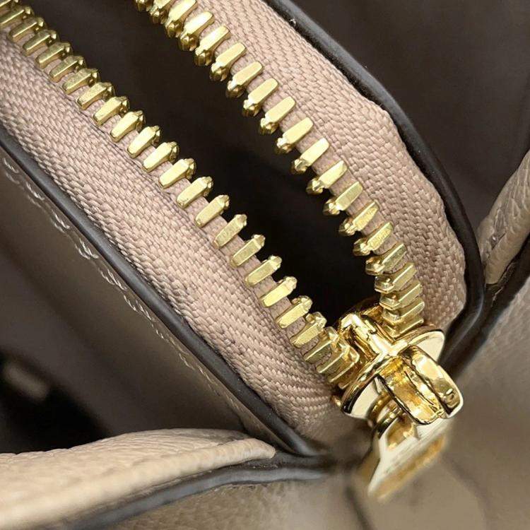 Pre Owned Louis Vuitton Montaigne BB Tourterelle Clair Monogram Empreinte Leather Handbag