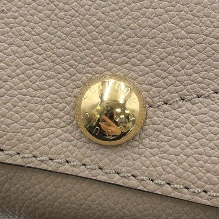 Pre Owned Louis Vuitton Montaigne BB Tourterelle Clair Monogram Empreinte Leather Handbag