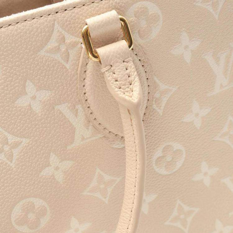 Pre Owned Louis Vuitton OnTheGo MM Rose Beige Monogram Empreinte Leather Tote Bag
