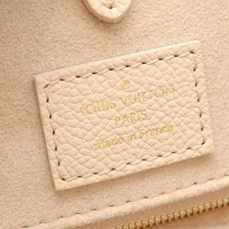 Pre Owned Louis Vuitton OnTheGo MM Rose Beige Monogram Empreinte Leather Tote Bag