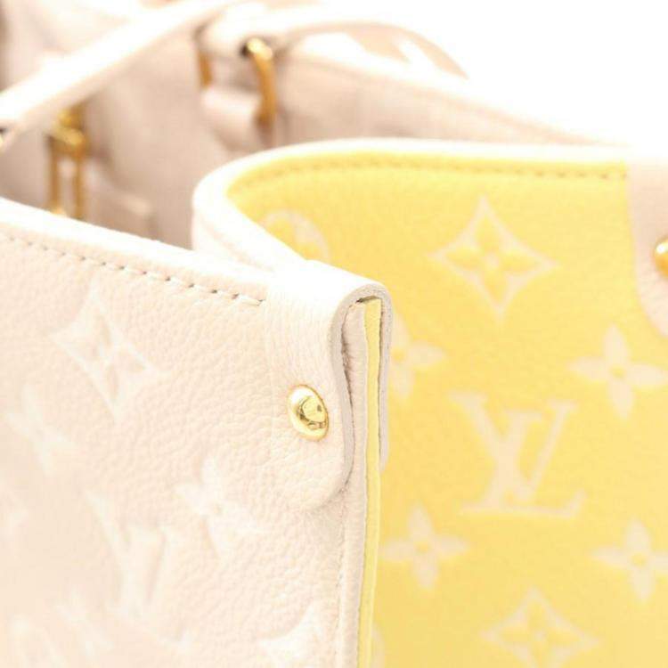 Pre Owned Louis Vuitton OnTheGo MM Rose Beige Monogram Empreinte Leather Tote Bag