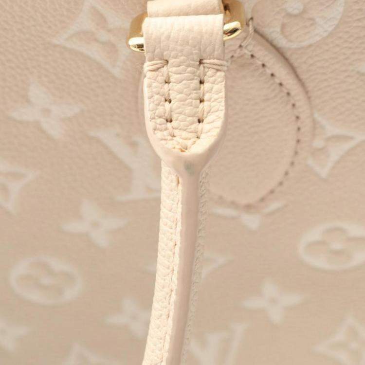Pre Owned Louis Vuitton OnTheGo MM Rose Beige Monogram Empreinte Leather Tote Bag