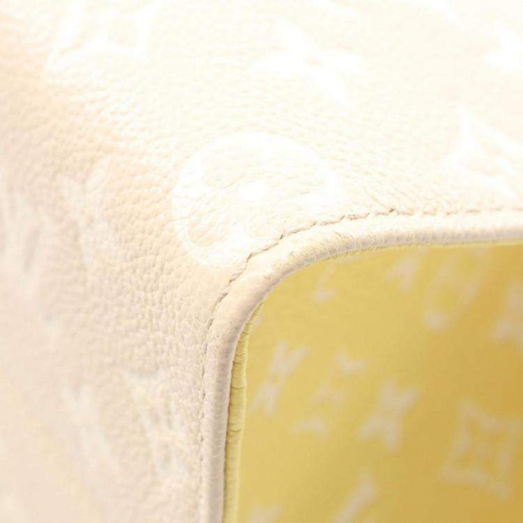 Pre Owned Louis Vuitton OnTheGo MM Rose Beige Monogram Empreinte Leather Tote Bag