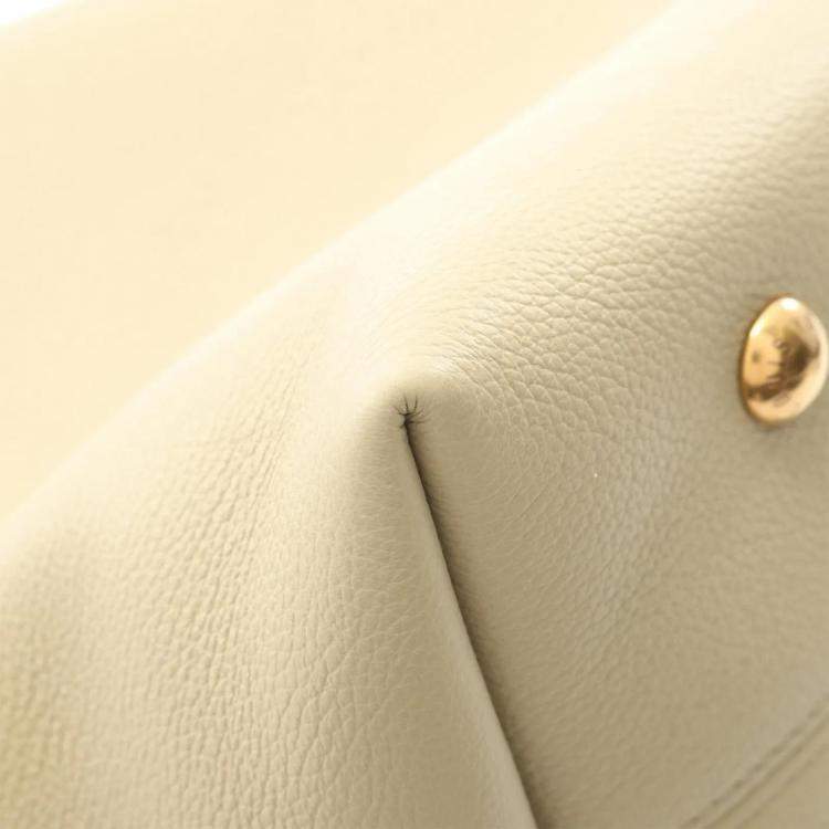 Pre Owned Louis Vuitton Low Key Hobo MM Limestone Leather Shoulder Bag