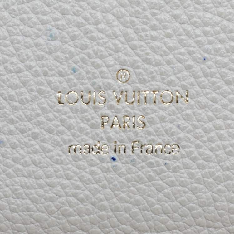 Pre Owned Louis Vuitton Off White Monogram Empreinte Leather Zippy Wallet