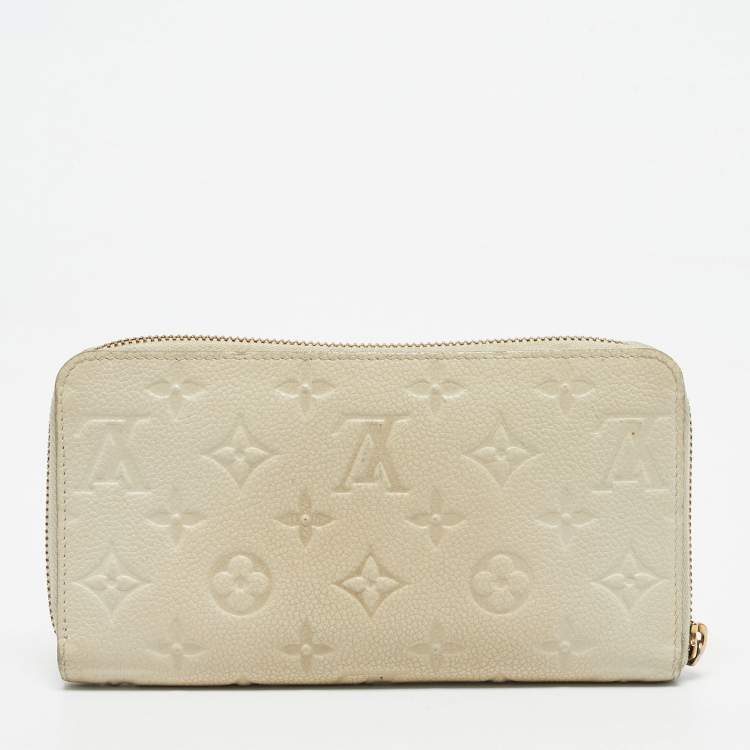 Pre Owned Louis Vuitton Off White Monogram Empreinte Leather Zippy Wallet
